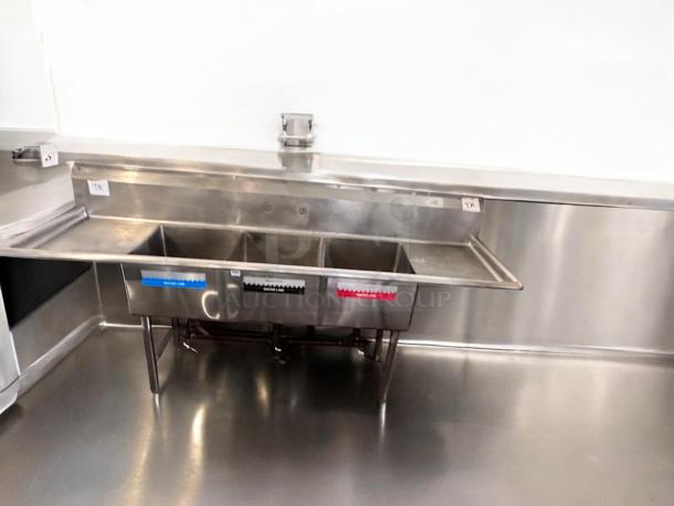 GSW stainless steel 3-compartment sink with dual drainboards, excellent condition, fully tested, commercial model.