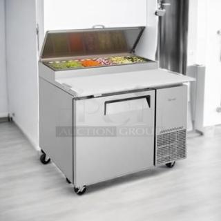 Brand new True prep table, model TPR-44SD-D2-N, 115V, factory sealed. Stainless steel, key for food prep efficiency.