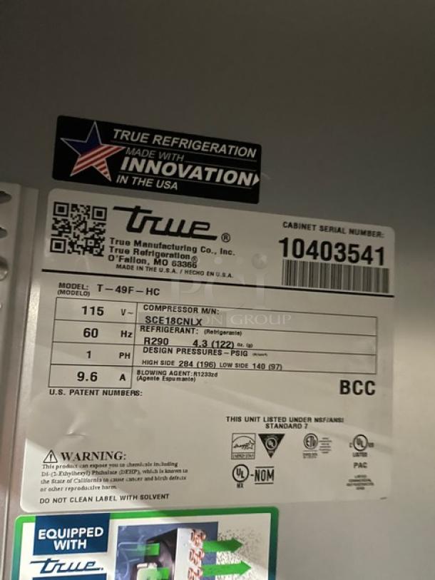 True Commercial Stainless Steel T-49F-HC 2 Door Reach In Freezer; Model: T49FHC; SN: 10403541; Poly Coated Racks; 115V; 1 Phase; On Casters.