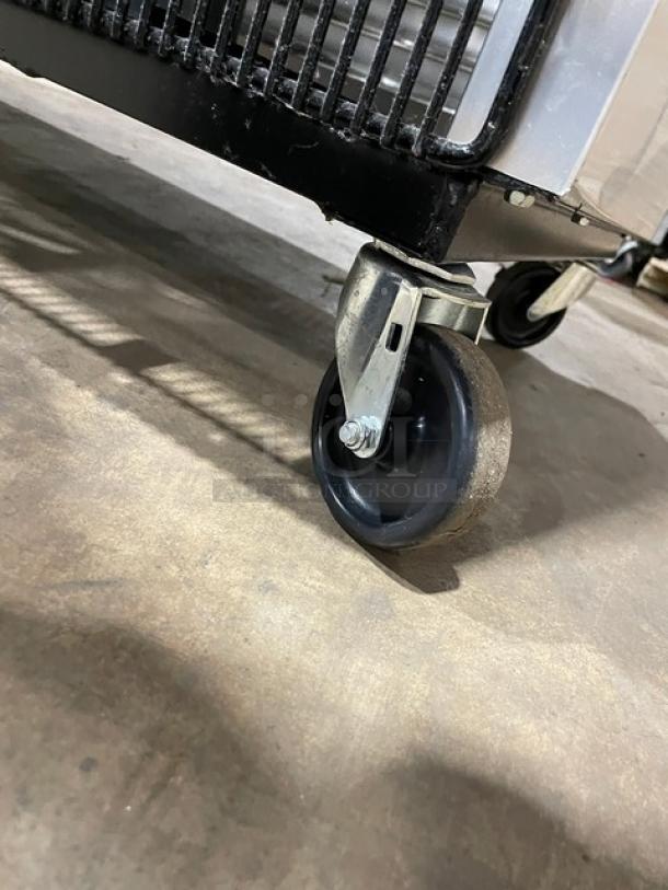 True T49FHC stainless steel freezer caster; durable, easy mobility, ideal for commercial use.