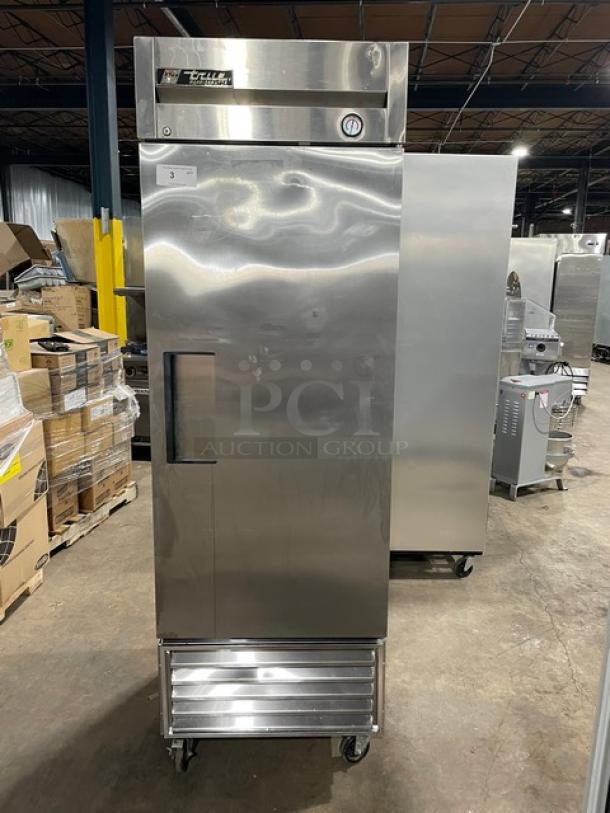 True T-23 commercial stainless steel single door reach-in refrigerator on casters, with poly-coated wired rack, model T-23, SN 1-3932455, 115V 1 Phase, excellent condition.