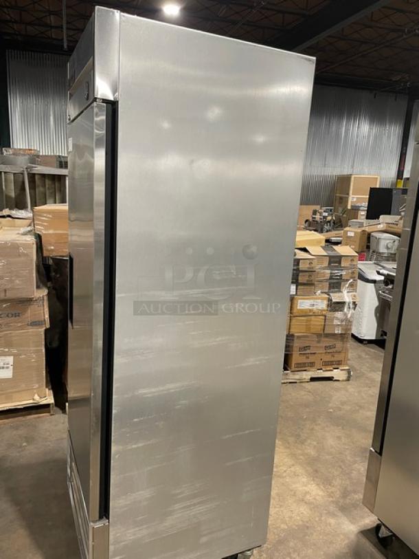 True T-23 commercial stainless steel single door reach-in refrigerator, poly coated wired rack, on casters, used condition.