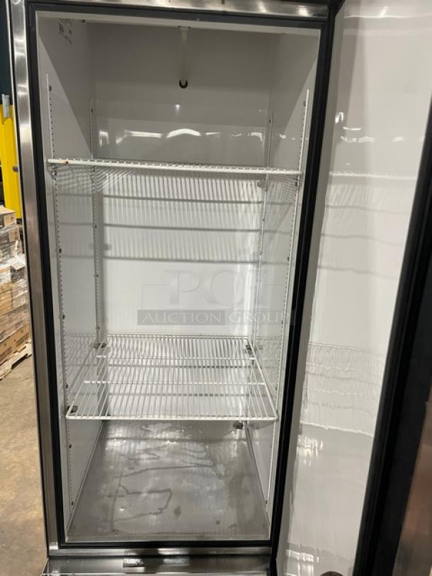 True T-23 commercial stainless steel reach-in refrigerator with poly-coated wire rack, single door, on casters, 115V.