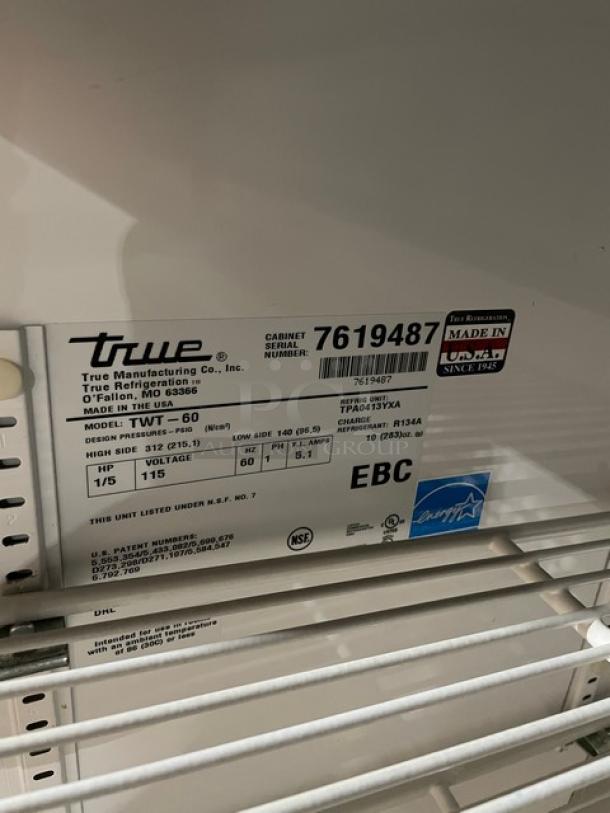 True TWT-60 Commercial Refrigerator, stainless steel, 2 doors, Energy Star, with backsplash, poly-coated rack, on casters.