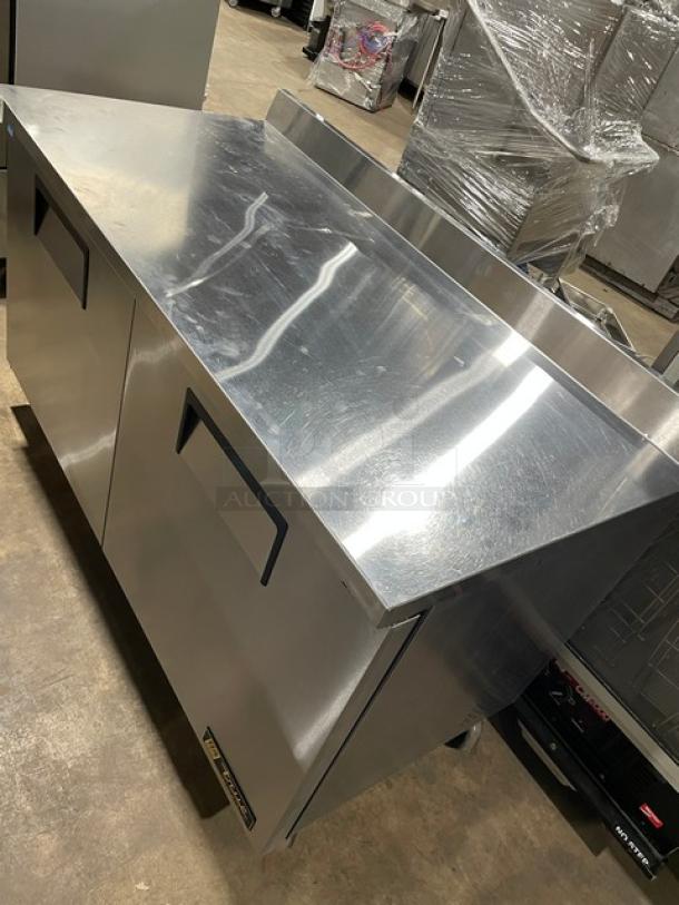 True Commercial Stainless Steel 2-Door Worktop Refrigerator, Model TWT-60, with backsplash and casters, Energy Star certified.