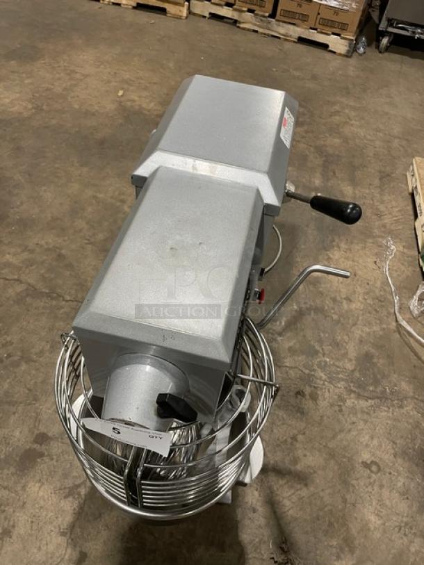 Univex SRM20 20 Qt. Planetary Mixer with stainless steel bowl guard, mixing bowl, flat beater, whisk, 115V, on legs.