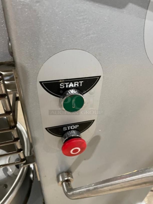 Univex SRM20 planetary mixer with start-stop controls, stainless steel bowl guard, flat beater, whisk, and bowl. Model: SRM20.