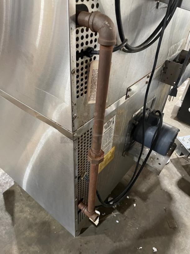 Southbend SilverStar Series commercial stainless steel double stacked convection oven, natural gas powered, with thermostatic controls and wired oven rack, on legs.
