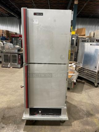 Cres-Cor commercial stainless steel insulated heated cabinet with Dutch doors, wide pan slides, rubber bumper, on casters.