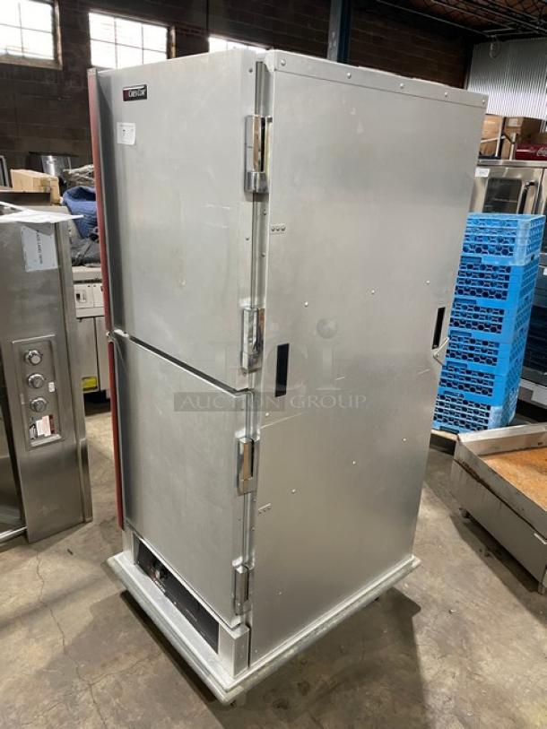 Cres-Cor stainless steel heated holding cabinet with solid Dutch doors, wide pan slides, rubber bumper guard, SN: CAB-J8369B-1716, on casters.