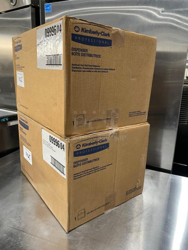 Kimberly Clark Sanitouch paper towel dispenser, model 09996, new in box, smoke black, commercial-grade, packaging labeled.