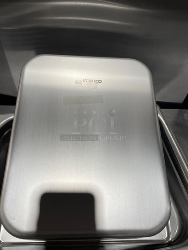 Winco stainless steel hotel pan, model SPJH-202, new condition. Marked with Winco logo and model identifier.