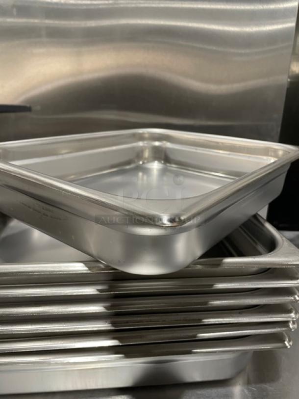 Winco SPJH-202 stainless steel hotel pan, new condition, stack of multiple pans shown, durable commercial quality.