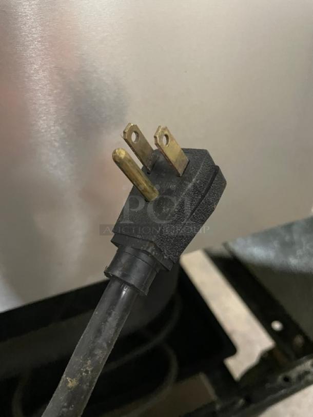 True T49 Commercial Stainless Steel Refrigerator Plug, 115V, shows power compatibility, essential detail for setup.