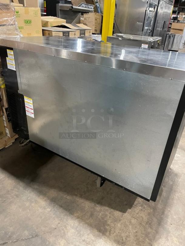 Beverage-Air black double glass sliding door merchandiser, BB58HC-1-F-GS-B-ALT model, with stainless steel top and poly-coated racks.