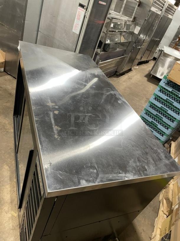 Beverage-Air BB58HC-1-F-GS-B-ALT double glass sliding door merchandiser with stainless steel worktop, black finish, poly coated racks.