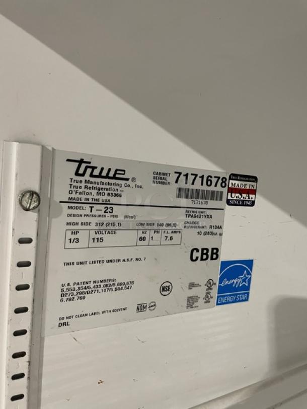 True T-23 commercial stainless steel refrigerator label showing model, serial number 7171678, Energy Star certification.