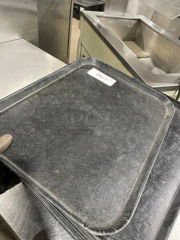 Commercial black rectangular fast food tray, textured surface, used condition, 16X quantity available.