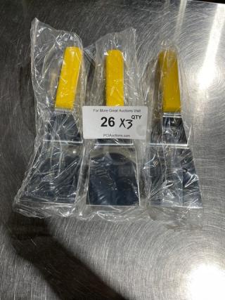 Dexter Russell Sani-Safe Series stainless steel hamburger turners, model S286-4, with yellow grip handles, new in packaging.