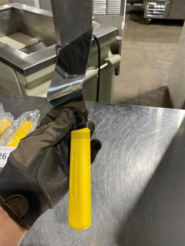 Dexter Russell Sani-Safe 4"x3" hamburger turner, stainless steel, yellow grip handle, Model S286-4, brand new.