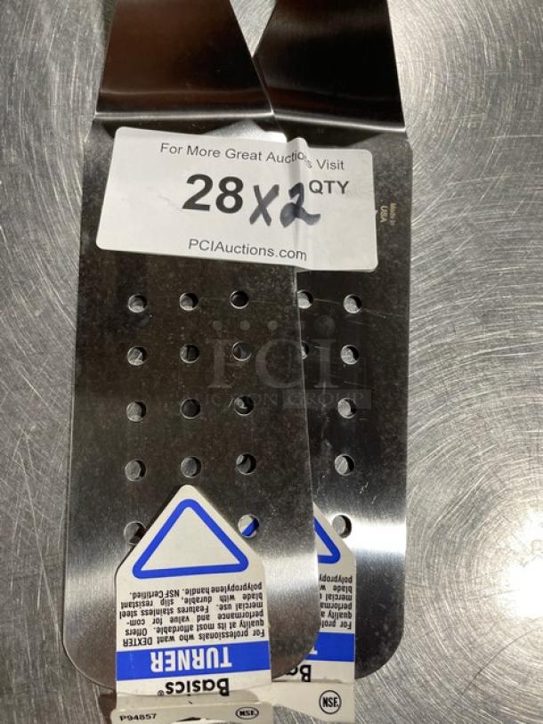 Dexter Russell perforated cake turner, model P94857, stainless steel, black handle, brand new with tags.