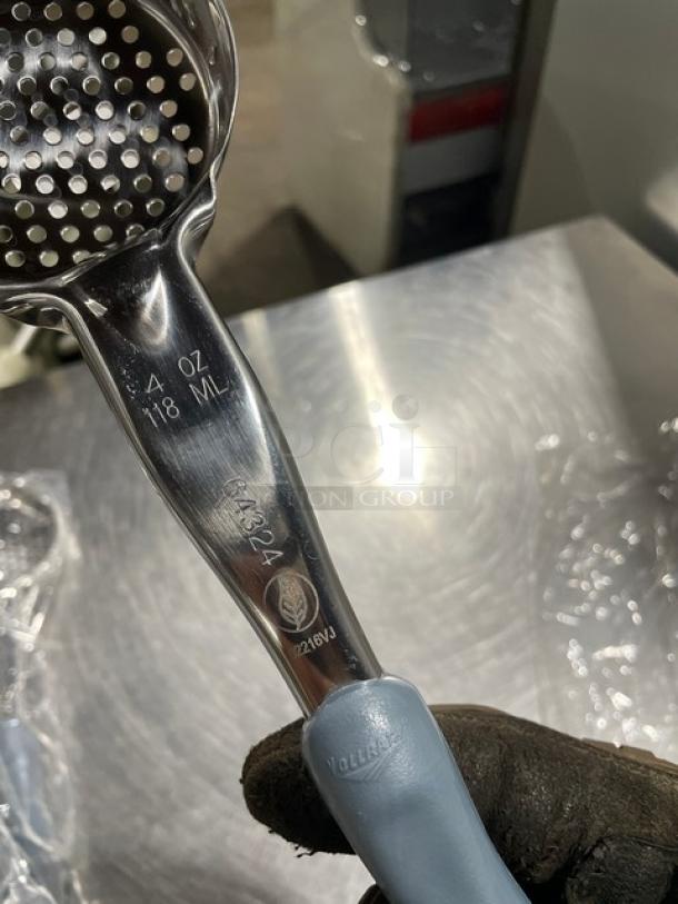 Brand new Vollrath 6432445 stainless steel perforated spoodle, 4 oz capacity, with gray grip handle.