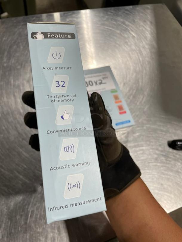 BRAND NEW infrared non-contact forehead thermometer. Model TG8818N. Features include 32-set memory, acoustic warning, infrared measurement.