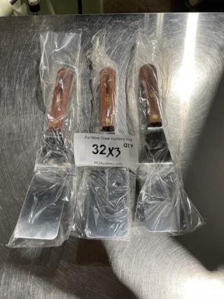 Dexter Russell stainless steel pancake turner, model S25412, with wooden handle, new condition, set of three.