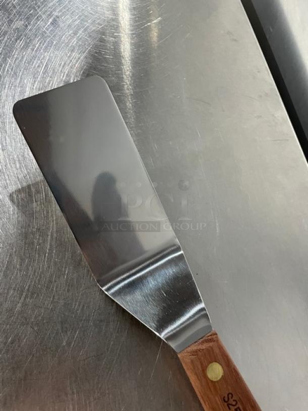 NEW Dexter Russell stainless steel pancake turner, model S25412, with 4-1/4"x2-1/8" blade, wooden handle, excellent condition.