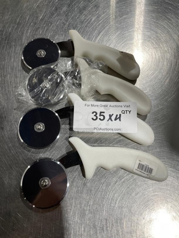 Dexter Russell PCP-2 pizza cutter, stainless steel, 2-3/4" blade, white grip handle, brand new, 35 units available.