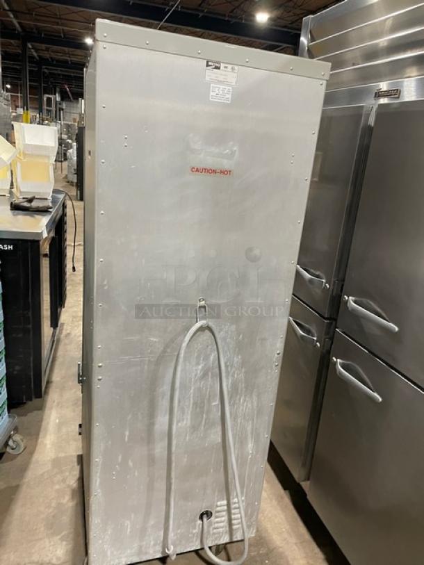 Metro FlavorView Series heated holding cabinet, Model C175-CM2000, features pan holding rack, 120V, on casters, caution-hot label.