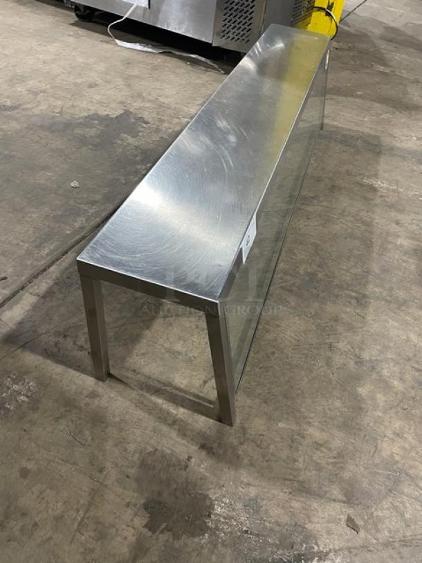 Commercial stainless steel serve over sneeze guard, durable construction, excellent condition, designed for food safety.