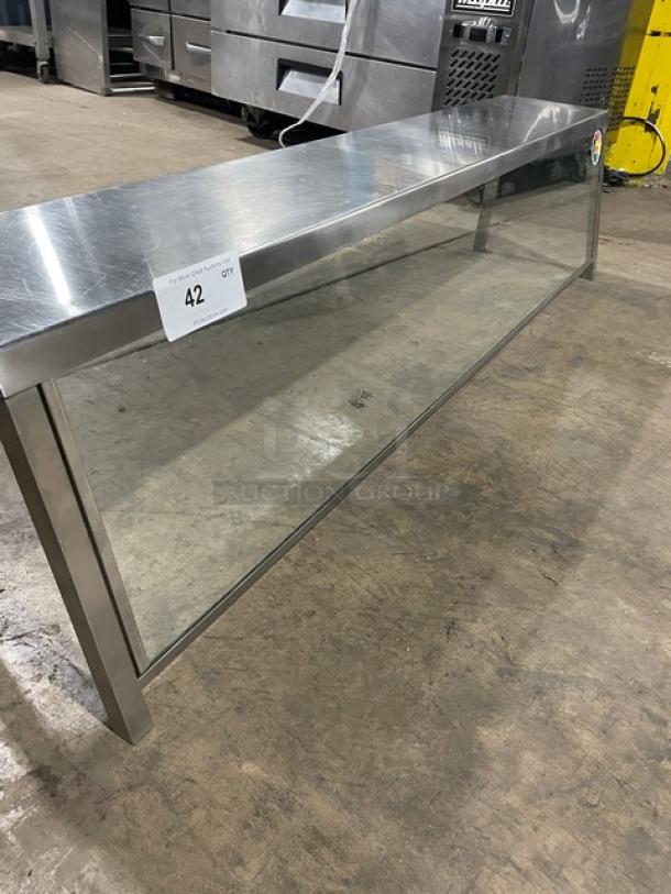 Commercial stainless steel sneeze guard, serve-over style, transparent glass panel, excellent condition, auction lot 42.