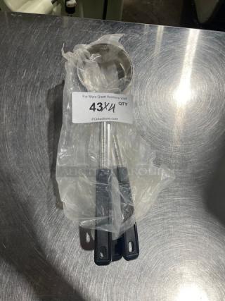 New ABC Commercial Stainless Steel 6 Oz. Portion Serving Spoon, Model PPG6S, with black grip handle, in original packaging.