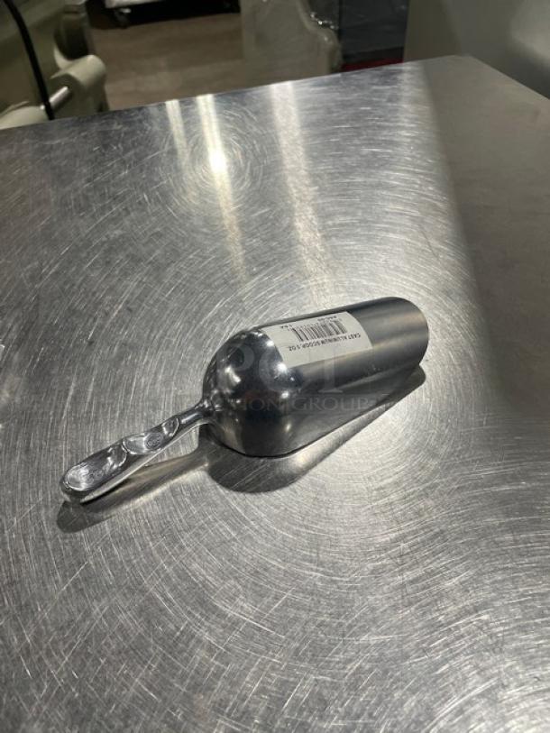 New commercial cast aluminum 5 oz. handheld scoop, model ASC-05, with barcode label. Mint condition.