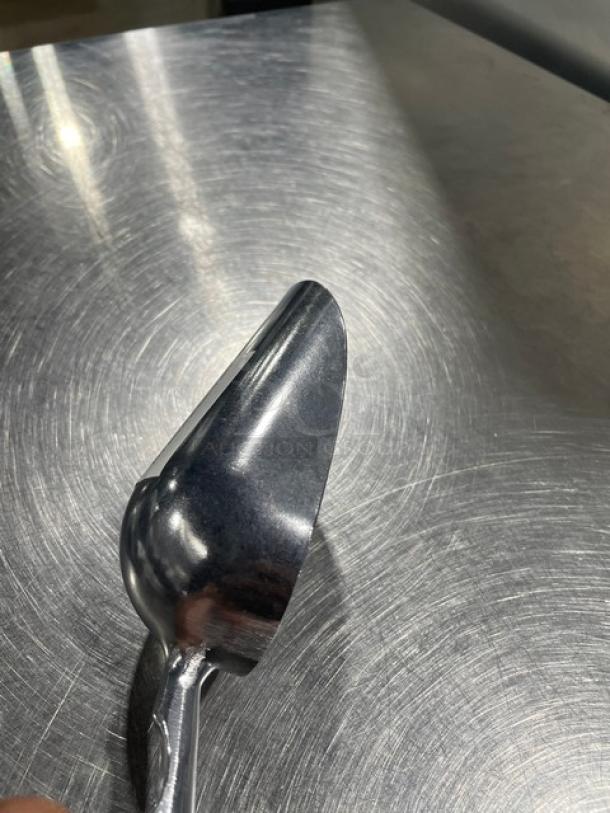New commercial cast aluminum 5 oz. handheld scoop, model ASC-05, sleek design, durable construction, ideal for versatile use.