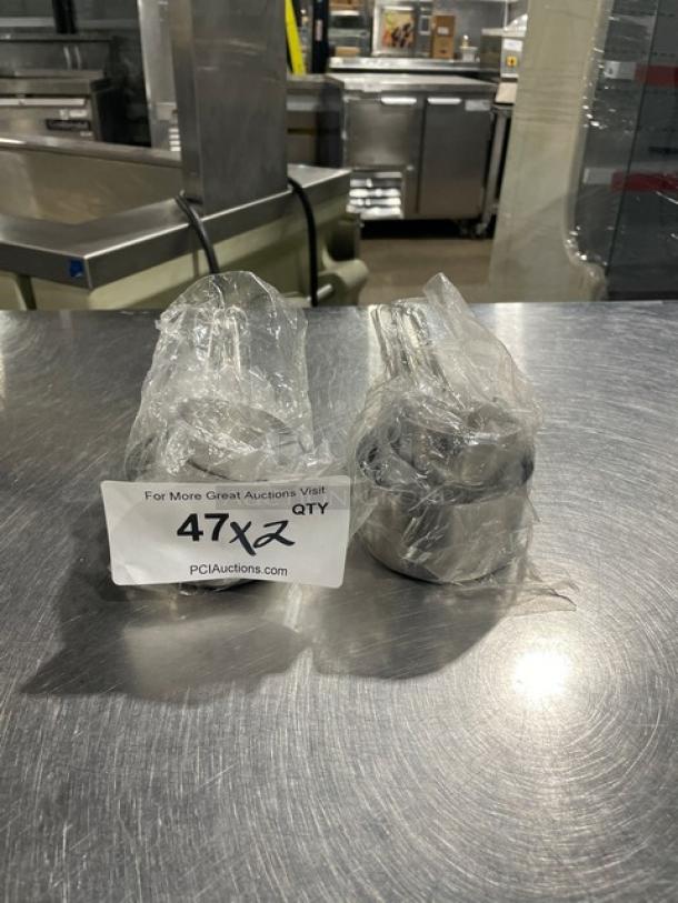 New commercial stainless steel measuring cup set, wrapped, perfect condition. Auction includes double quantity.