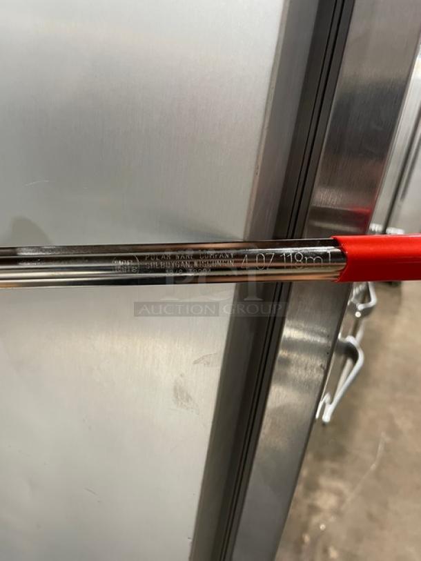 New Polar Ware stainless steel ladle, 4 oz capacity, red grip handle, engraved with brand details, commercial-grade quality.