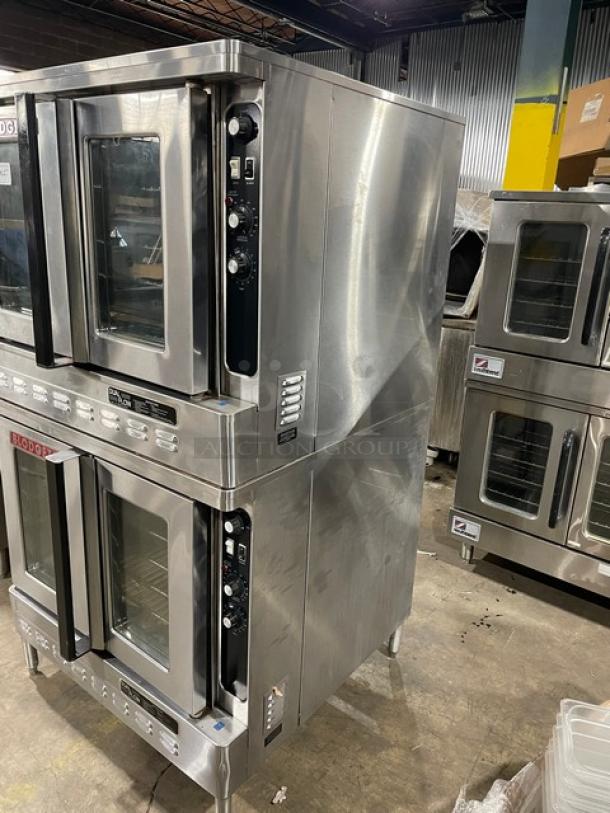 Blodgett stainless steel natural gas double-stacked convection oven with solid state thermostatic control and wired rack.