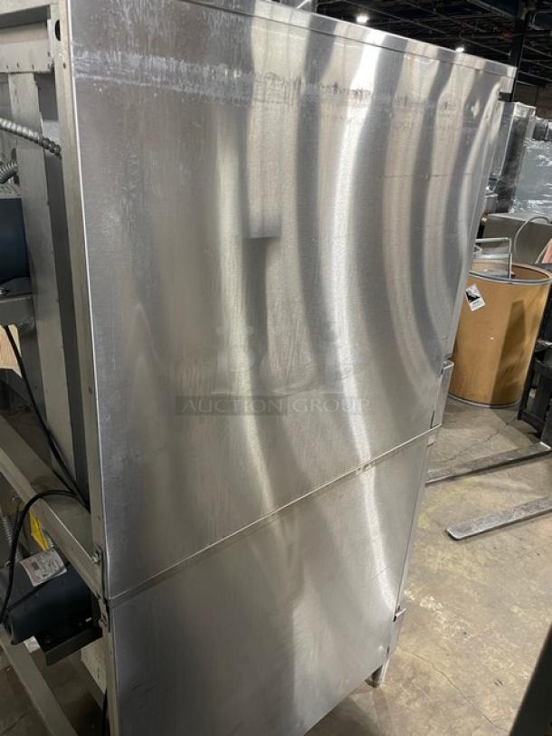 Blodgett commercial stainless steel double-stacked convection oven, natural gas powered, with solid state thermostatic control, on legs.