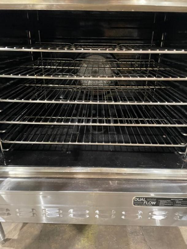 Blodgett commercial stainless steel natural gas double convection oven, dual-flow, with wired rack and solid state control.