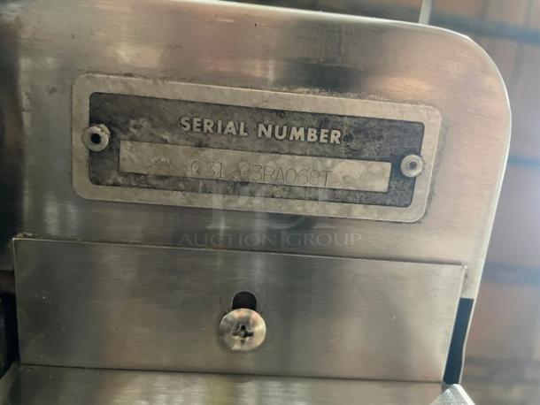 Blodgett stainless steel natural gas double convection oven, serial number 031203RA068T, features solid state thermostatic control.