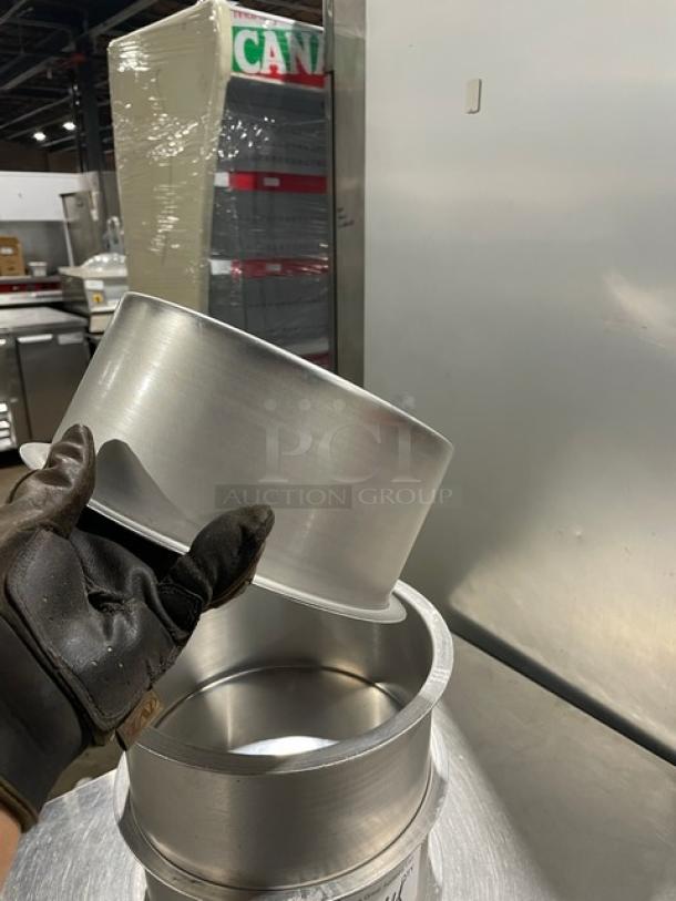 Lot of commercial round stock pots, stainless steel, shown in clean, excellent condition. Includes multiple pots.