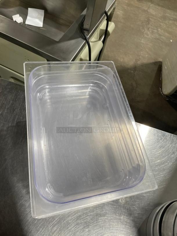 Clear polycarbonate food pan for commercial use, rectangular shape, durable, transparent. Multiply bid by six units.