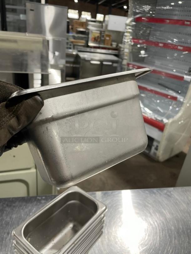 Don commercial stainless steel hotel pan, gently used, visible surface marks, stackable design, ideal for steam tables.