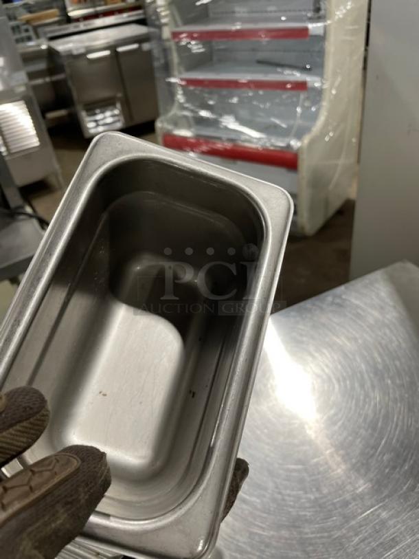 Don Commercial Stainless Steel Steamtable Pan, rectangular, durable, lightly used, ideal for hotel kitchens.
