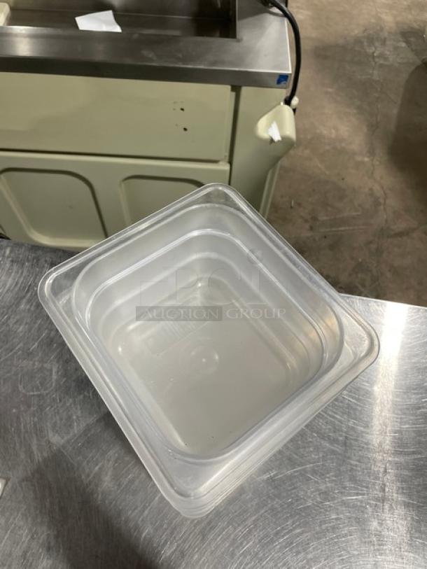 Vigor commercial clear polycarbonate food pan, 8x capacity, durable design, excellent condition, visible markings confirm authenticity.