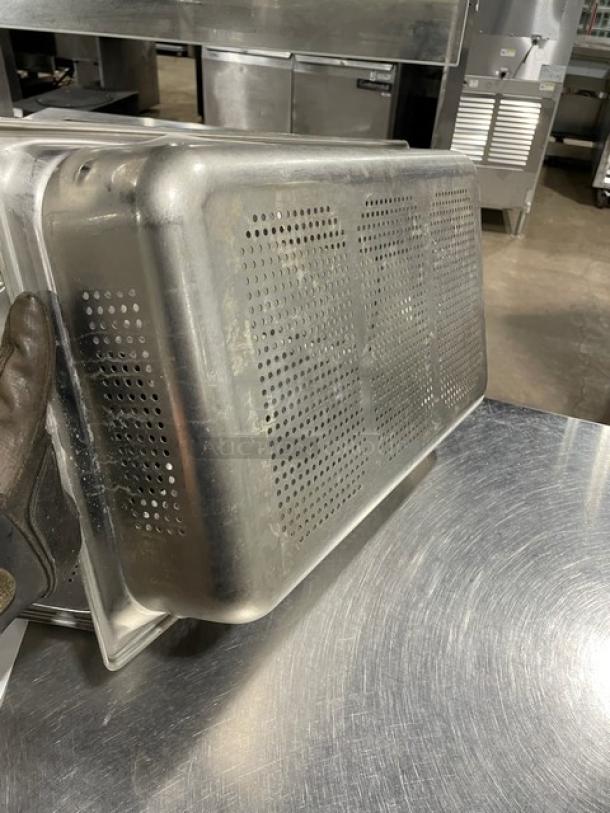 Commercial stainless steel perforated hotel steamtable pan, used condition, vented sides, durable for professional kitchens.