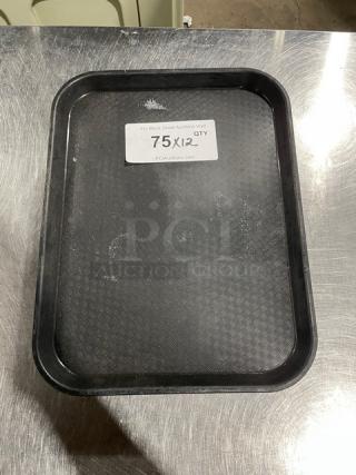 Cambro commercial black serving tray, slightly used, textured surface; 12 included per bid. Label states "75QTY x12".