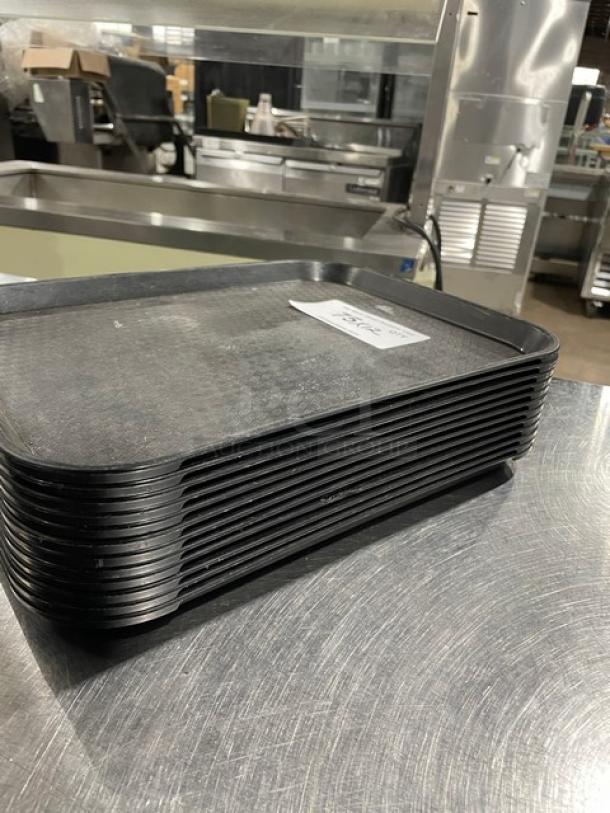 Cambro commercial black fast food serving trays, stack of 12, lightly used, rectangular, durable plastic, 12x quantity.